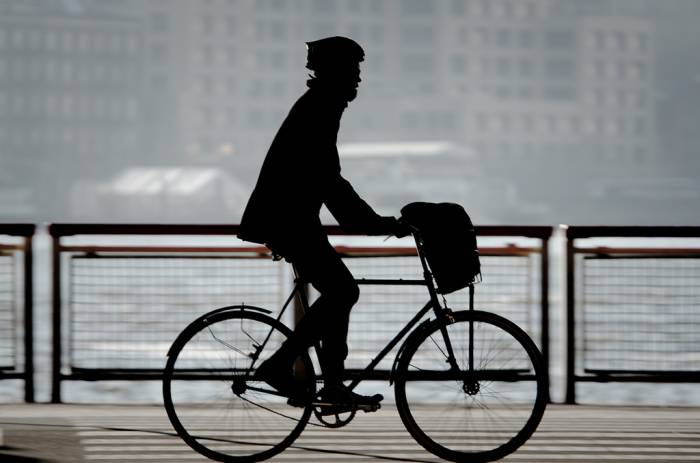 Bicycle Commuting, Transportation Efficiency and Safety: A US Cities Perspective